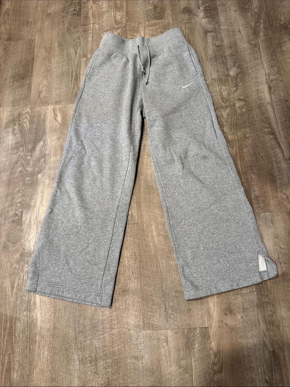 Nike women’s Grey Wide leg high waist  sweatpants with flare leg and slit bottom